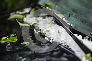 Large hail ice balls on car hood