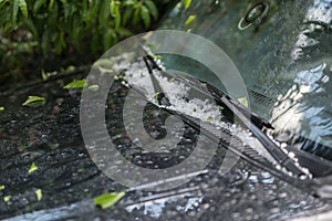 Large hail ice balls on car hood