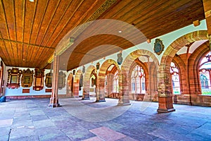 Large hall with arcades and view on Great Cloister, Basel Minster, Switzerland