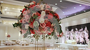 A large hall for celebrations. Interior of a wedding hall wedding decoration. Elements flower decoration