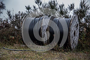 Large heavy cable drums with insulated copper cables