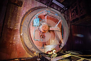 Large hermetic door of airlock of abandoned bunker