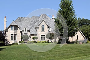 Large home with cedar shake roof