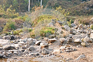 Large Igneous River Boulders and rocks has been carried by the river on the remote mountain place. Rangbang river mountain valley.