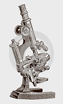 Large inclinable optical microscope with hinged joint and clamping lever