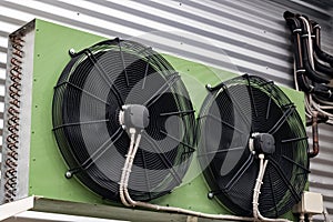 Large industrial air conditioning on a building wall