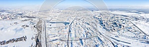 Large industrial area of the city in chilly winter day. panoramic aerial view