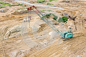 Large industrial crawler crane at construction site. aerial view
