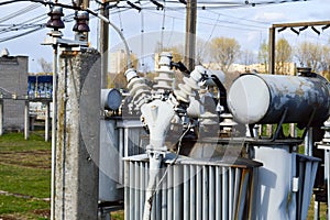 Large industrial iron metal transformer substation with transformers and high-voltage electrical equipment