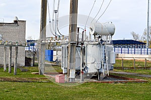 Large industrial iron metal transformer substation with transformers and high-voltage electrical equipment