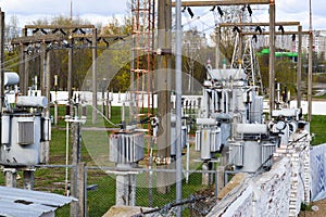 Large industrial iron metal transformer substation with transformers and high-voltage electrical equipment