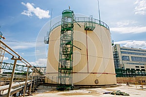 Large industrial round tanks for chemical production or oil. Construction of chemical factory