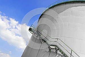 Large industrial silo with blue sky
