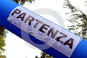 Large inflatable portal with the big Italian Written PARTENZA wh photo