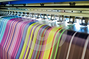 Large inkjet printer working multicolor on vinyl banner