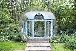 Large iron blue gazebo for relax outdoor. Wedding decorations. exterior Romantic alcove. Decor autumn terrace.