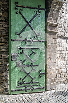 Large, iron reinforced door at Castle Gravensteen in Ghent, Belgium
