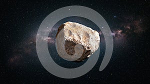 A large, irregularly shaped asteroid in space.