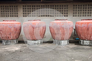 Large jar made of concrete for rainwater storage. It is commonly used in rural areas.