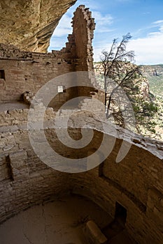 Large Kiva and Remaining Stone Wall On The Edge of Balcony House