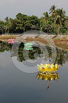 Large krathongs in the river.