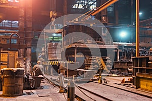 Large ladle container for iron casting in metallurgical factory inside, heavy industry