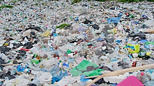 Large landfill of toxic plastic waste. Large-scale environmental disaster for nature.