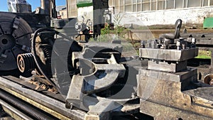 Large lathe and radially drilled machine made in the USSR, metal cutting equipment thrown into the street and falls into