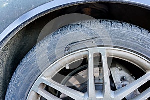 Large long mechanical cut damage on tire sidewall photo