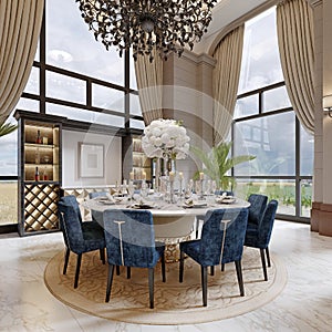 Large luxurious dining table in the large living room with high ceilings in a modern classic style with blue chairs and a white