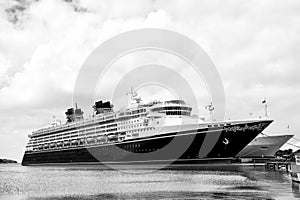 Large luxury cruise ship Disney Wonder on sea water and cloudy s