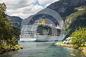 Large luxury cruise ship in Norway fjords