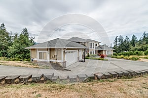 Large luxury mansion home house real estate driveway wrap around trees Pacific Northwest