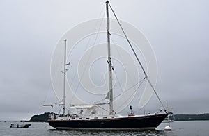 Large Luxury Sailboat Anchored in a Harbor