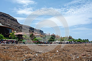 Large market in the streets of the Spanish city of Puerto de Mogan, Spain photo