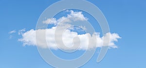 Large megapixel long solo cloud in blue sky photo