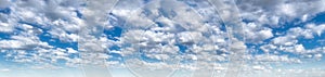 Large megapixel scattered clouds in blue sky photo