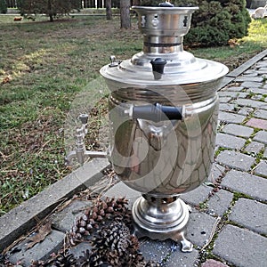 A large metal container used, especially in Russia, to heat water for tea, samovar