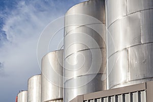 Large metal industrial tanks for petrol and oil of refinery indu