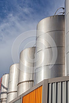 Large metal industrial tanks for petrol and oil storage in refin