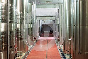 Large metal vats for fermentation of wine factory