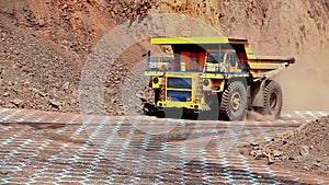 Large mining dump truck. Large dump truck in a coal mine. Visualization of the work of artificial intelligence.