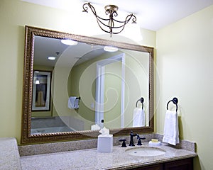 Large mirror above sink