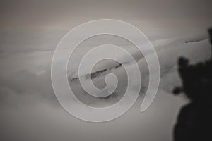 Large misty cloud climbing mountain valley in slovakia, Tatra - vintage retro look