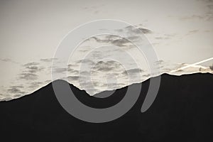 Large misty cloud climbing mountain valley in slovakia, Tatra - vintage retro look