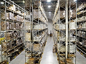 Large modern blurred warehouse industrial and logistics companies. Warehousing on the floor and called the high shelves photo