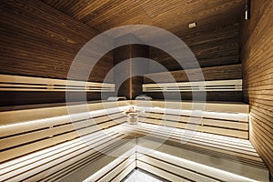 Large modern sauna with moody lighting