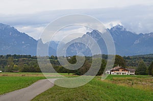 Large mountains surround the Italian countryside