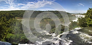 Large nature panorama of Iguacu (Iguazu) waterfall cascade on border of Brazil and Argentina