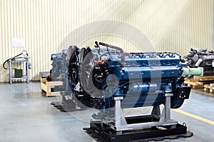 Large new diesel engines in the workshop of the factory for the production of trucks. Car`s motor.